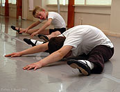 Boys dance class stretching before ballet begins.