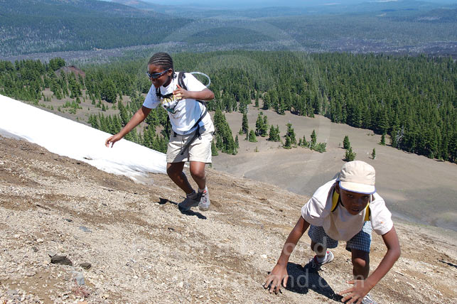 Kids scrambling up Belknap